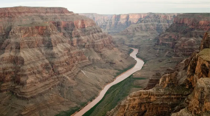 Aerial view of the Colorado River winding through the Grand Canyon West Rim