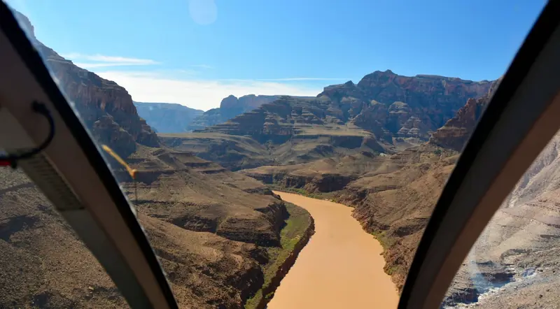 Colorado River seen through the windows of a Grand Canyon helicopter