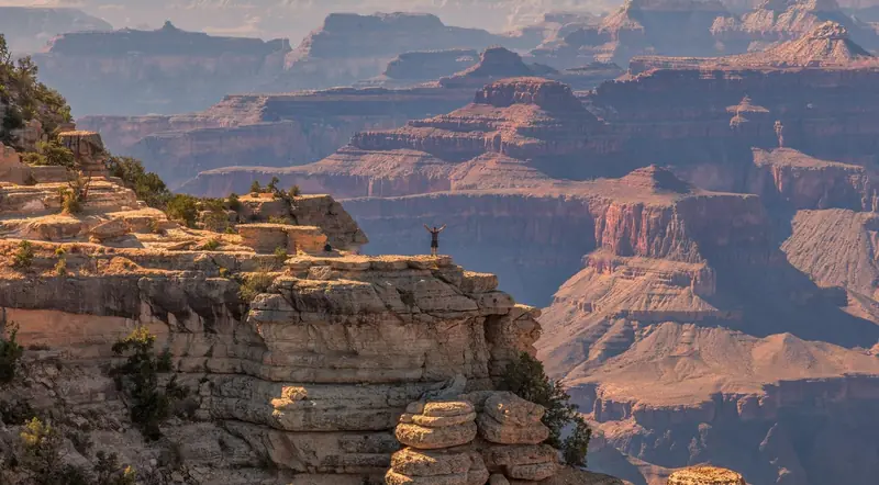Visitor on a Grand Canyon West Rim viewpoint above the canyon